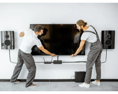 electrician mounting a TV 1